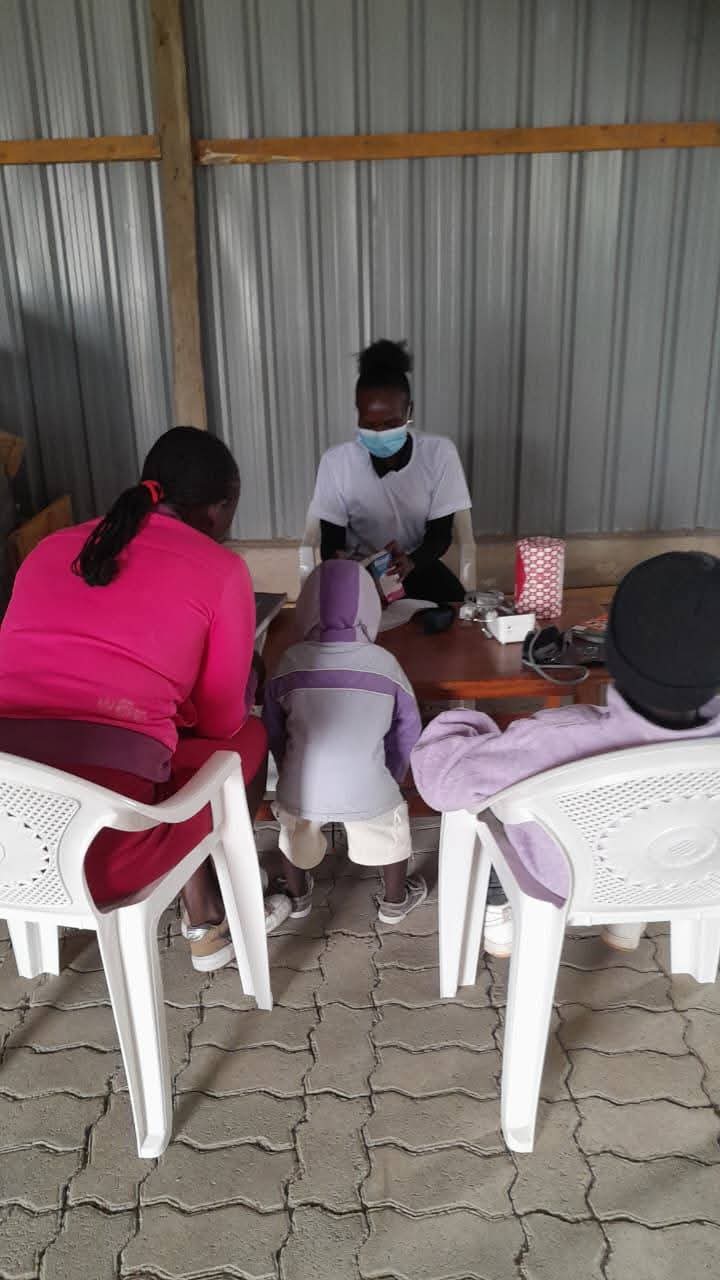 Healthcare workers and community members during a free medical camp